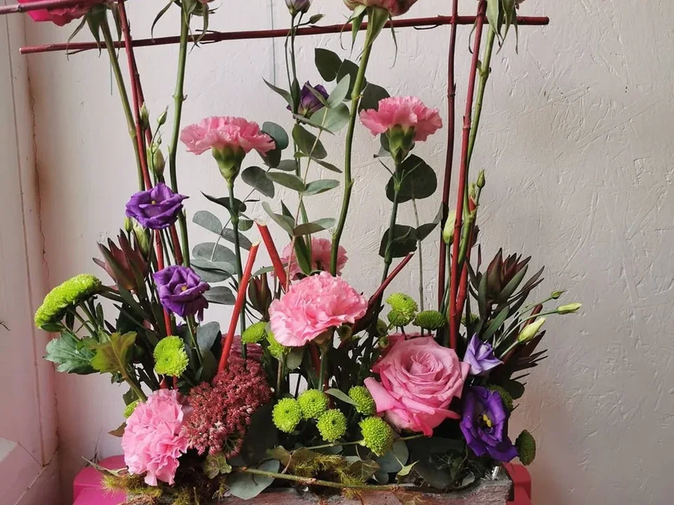 Tall pink structural floral display