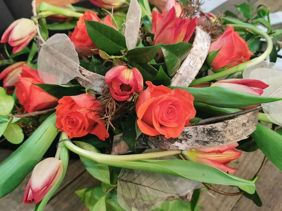 Vibrant tulip and rose gift arrangement