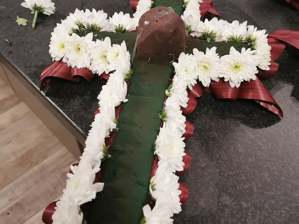 White chrysanthemum cross tribute