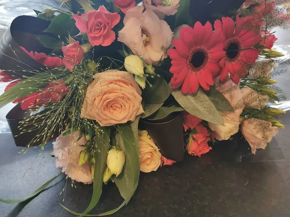 Peach and cerise bridal bouquet