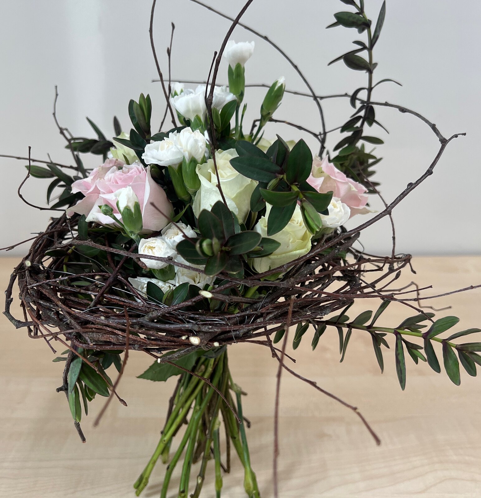 Natural hand-tied floristry design for one-to-one learning